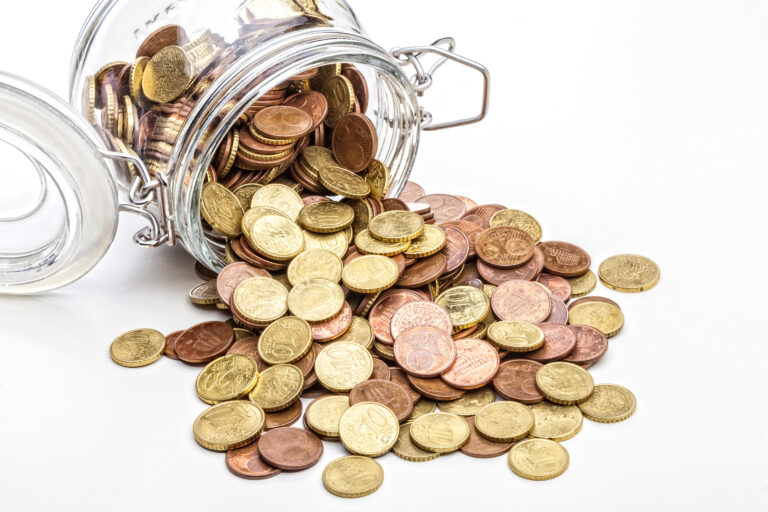 glass jar with coins